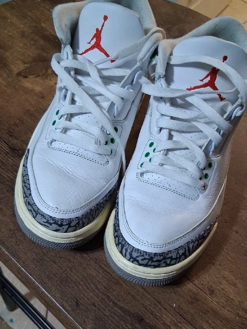 Jordan White Leather Athletic Sneakers with Green and Red Accents
